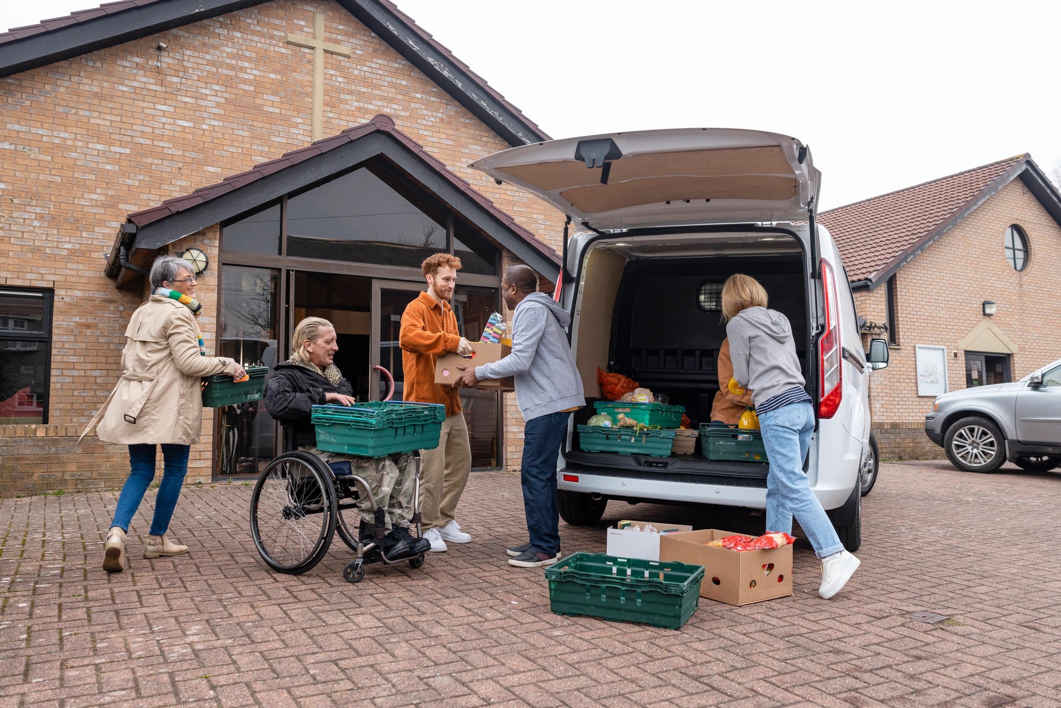 Delivery team handling food and package distribution